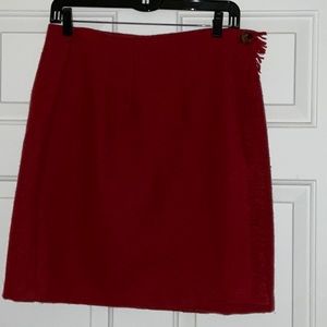 Woolrich burgundy wrap around skirt. Size 10 and length is 20 in.